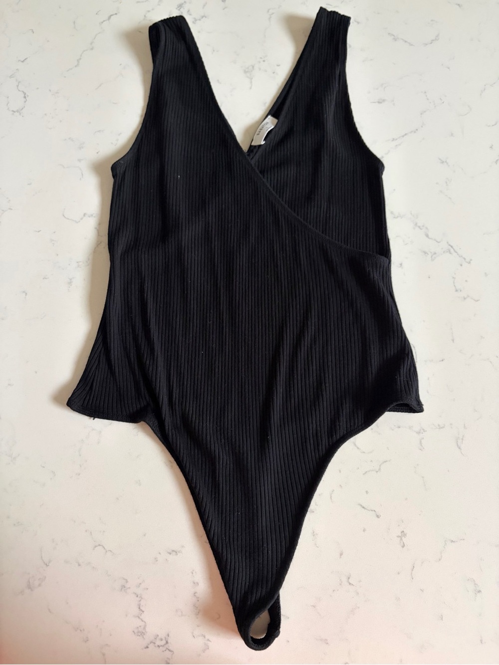 Babaton Black Ribbed Wrap-Front Kids One-Piece